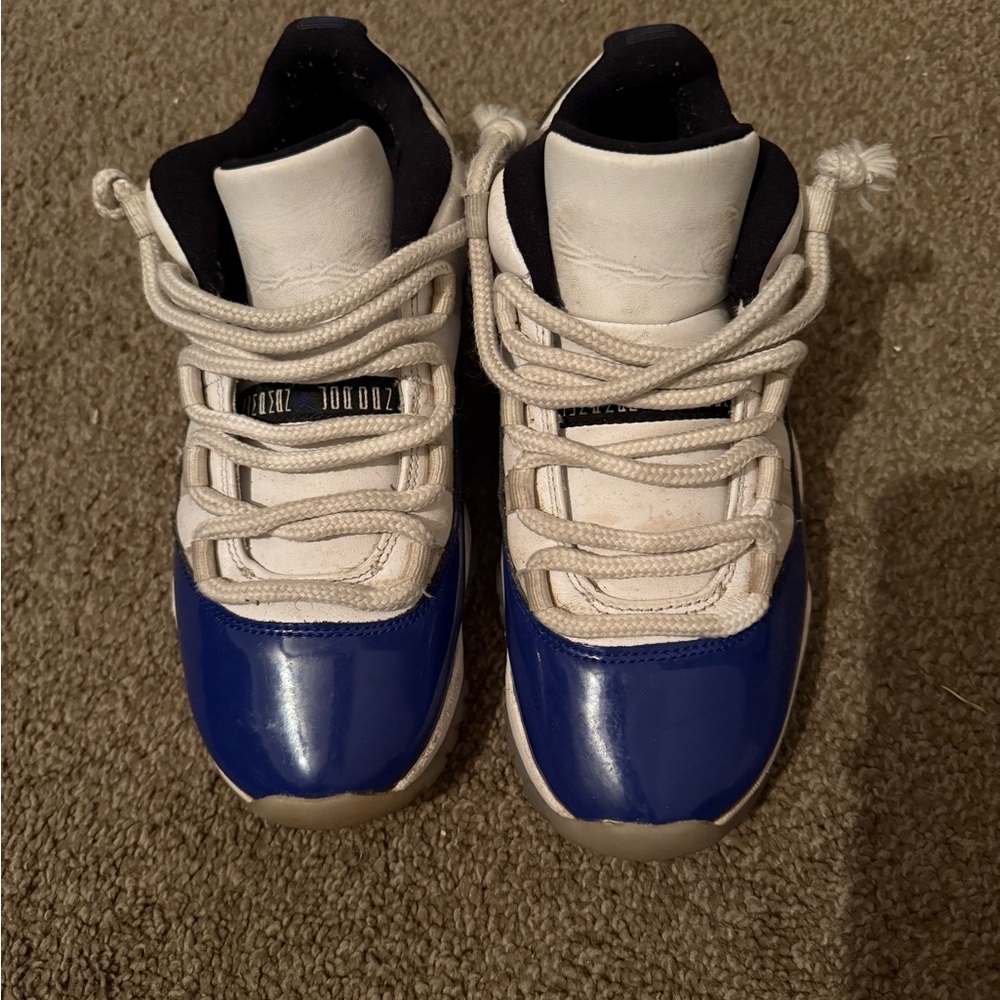 Blue and White Jordan 11 Low. size 7.5